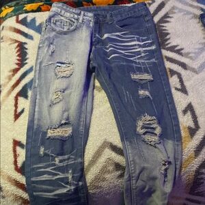 Distressed Blue Denim Jeans